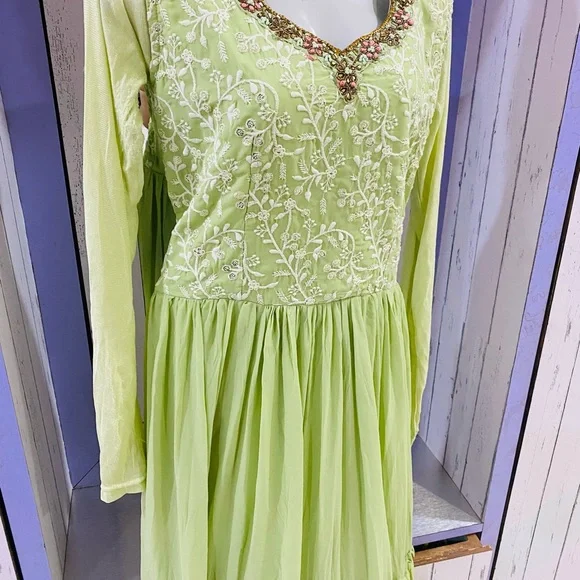 Full flaired beautifully embroidered pastel green gown for party wear - Picture 8 of 11